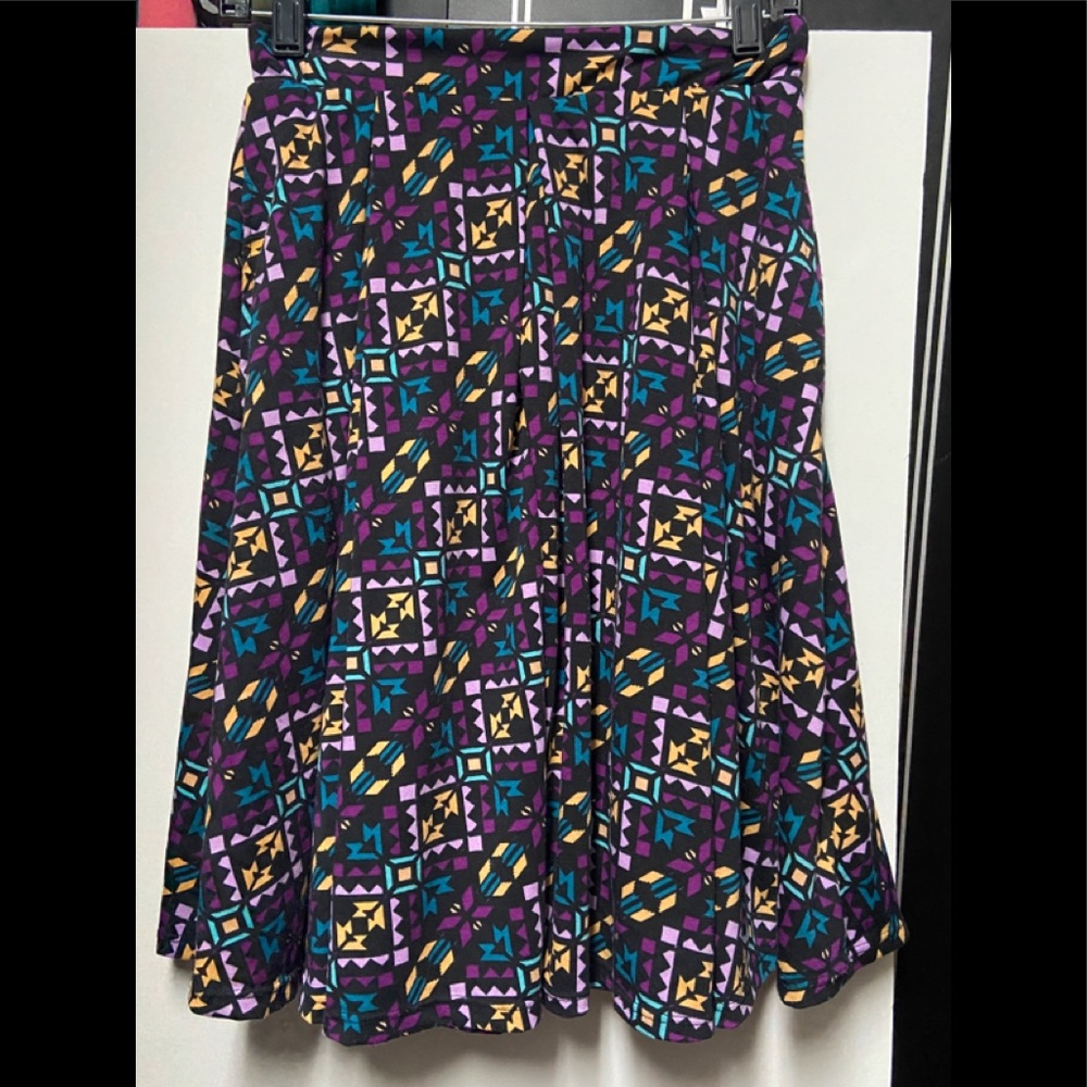 LuLaRoe XS skirt (Purples, blues, yellows, and a black base).